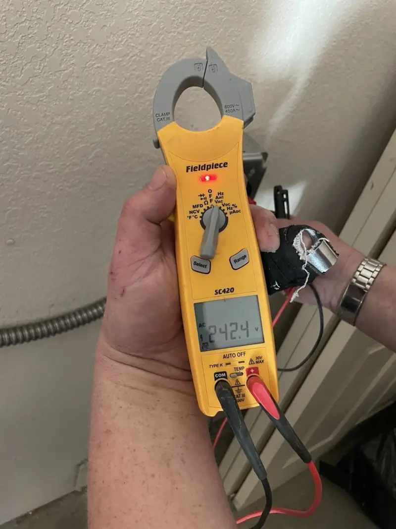 Voltage testing with clamp meter during Ceiling Fan Installation in Radnor